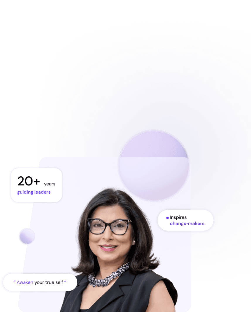 Portrait of Neerja Bhatia wearing black top and glasses with necklace, smiling